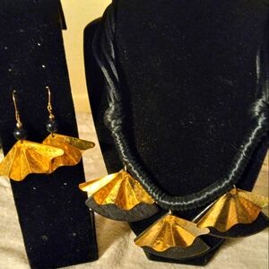 Used not new 2pc jewerly set black cording necklace with gold fan detail&earring